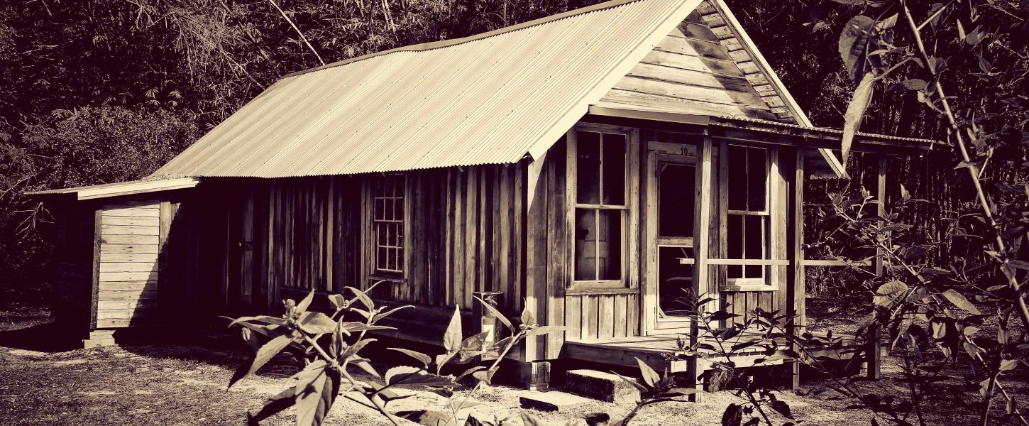 A black and white photo of a Koreshan house.