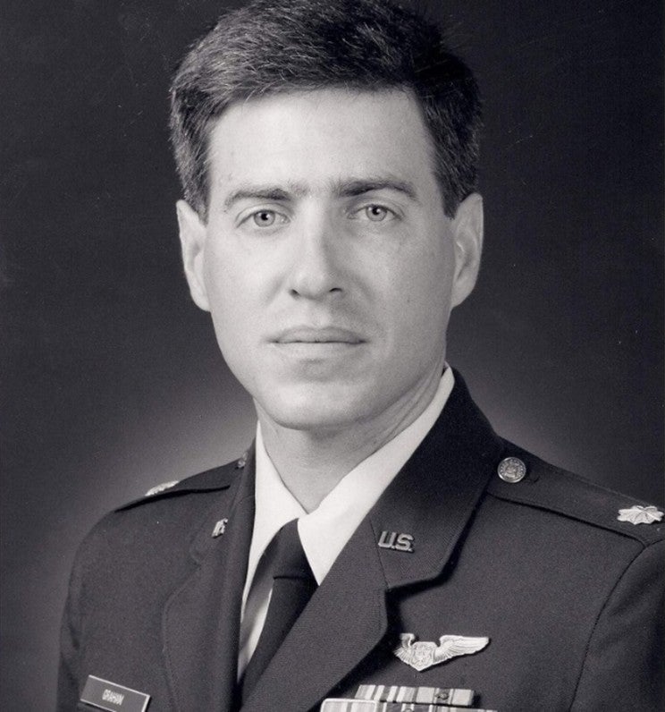 A man in class A USAF uniform. 