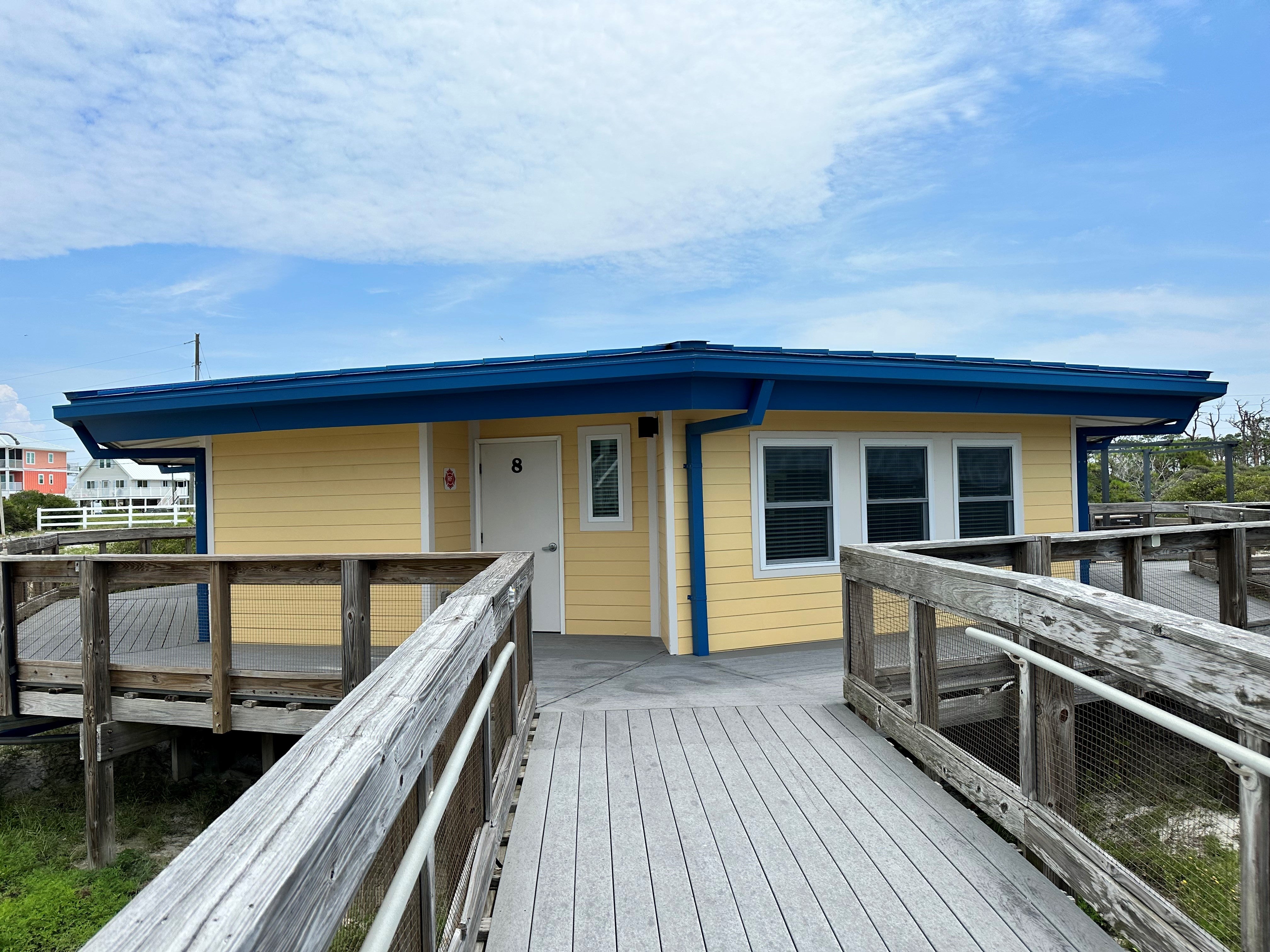 The boardwalk leads to Cabin 8