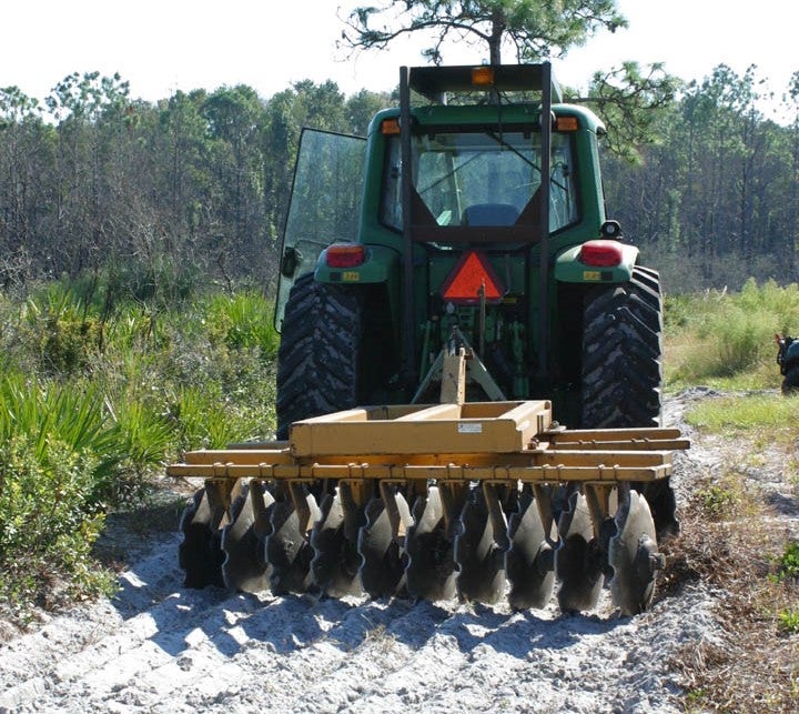 The dozer creating a fire line.