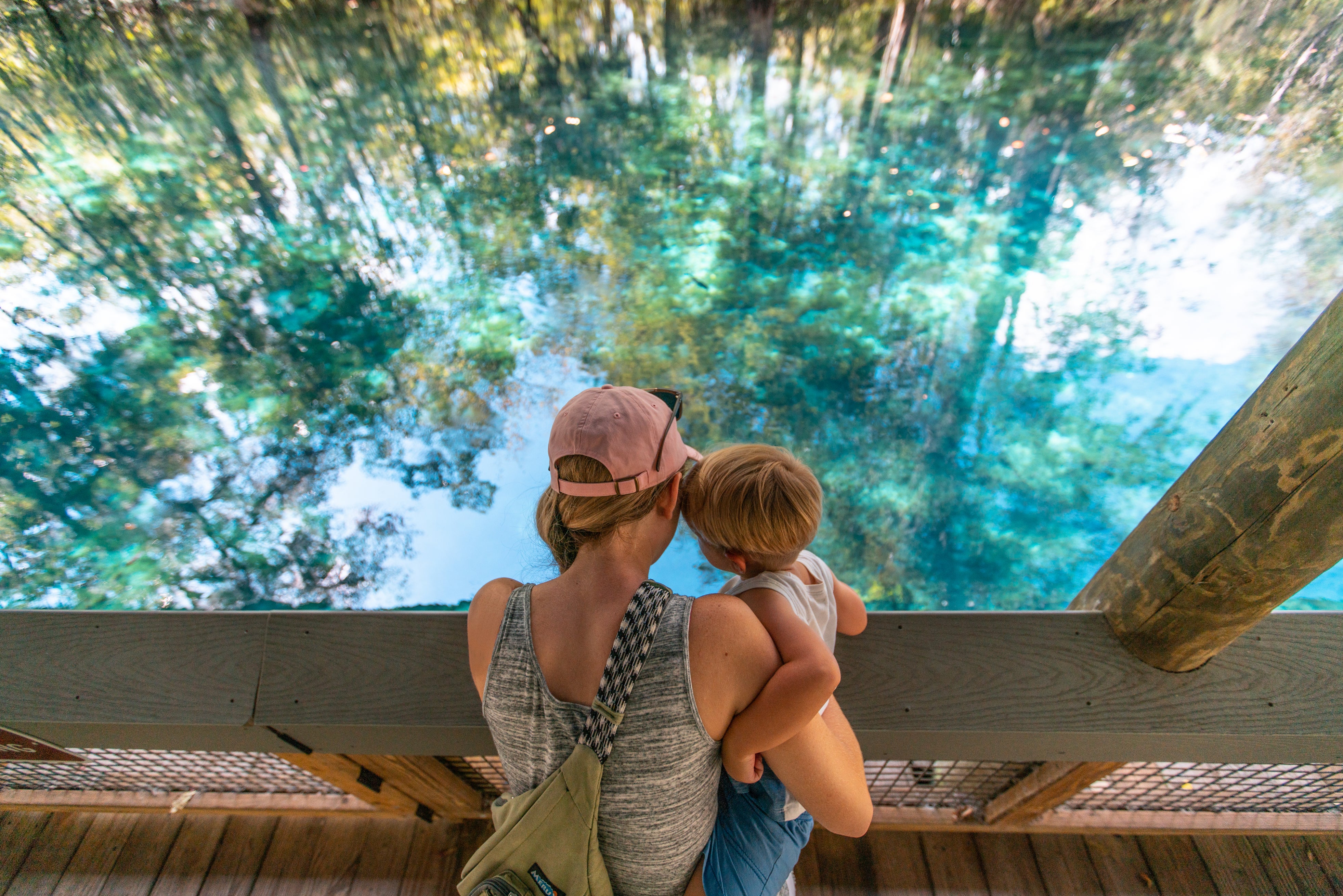 Family Viewing River From Boardwalk