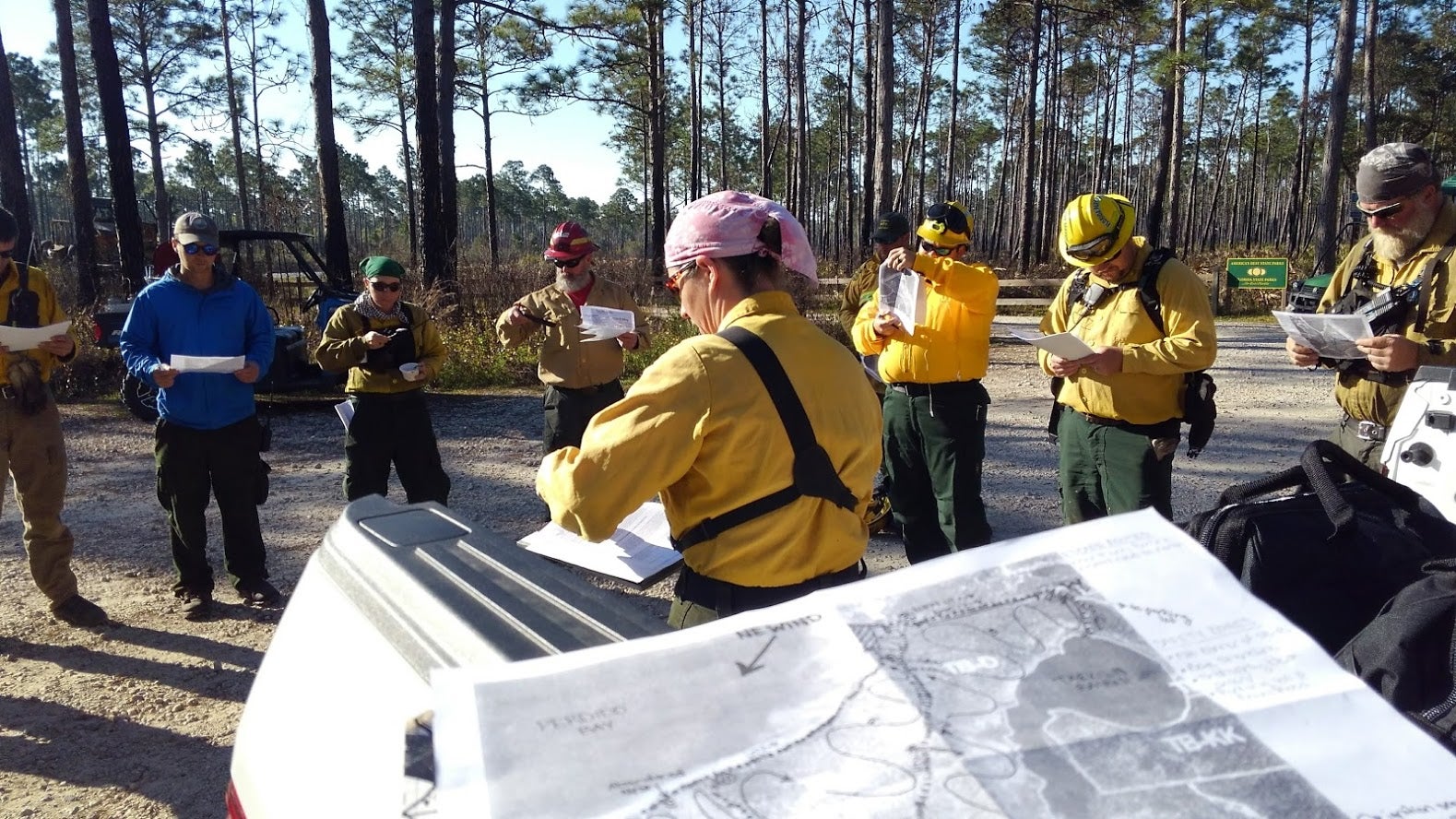 A prescribed fire crew briefing. 