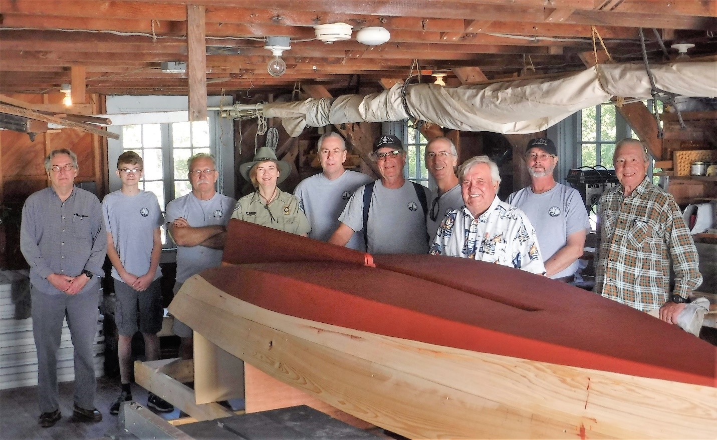 James with boat in progress—second from left