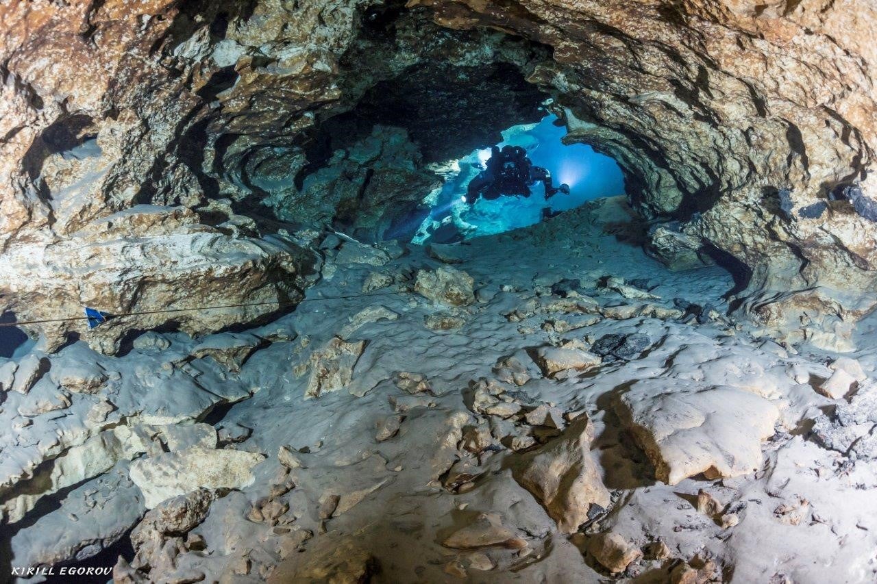 Kirill Egorov in a cave at Madison Blue