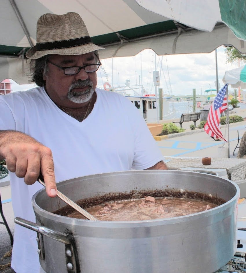 A photo of Nick Koulianos cooking.