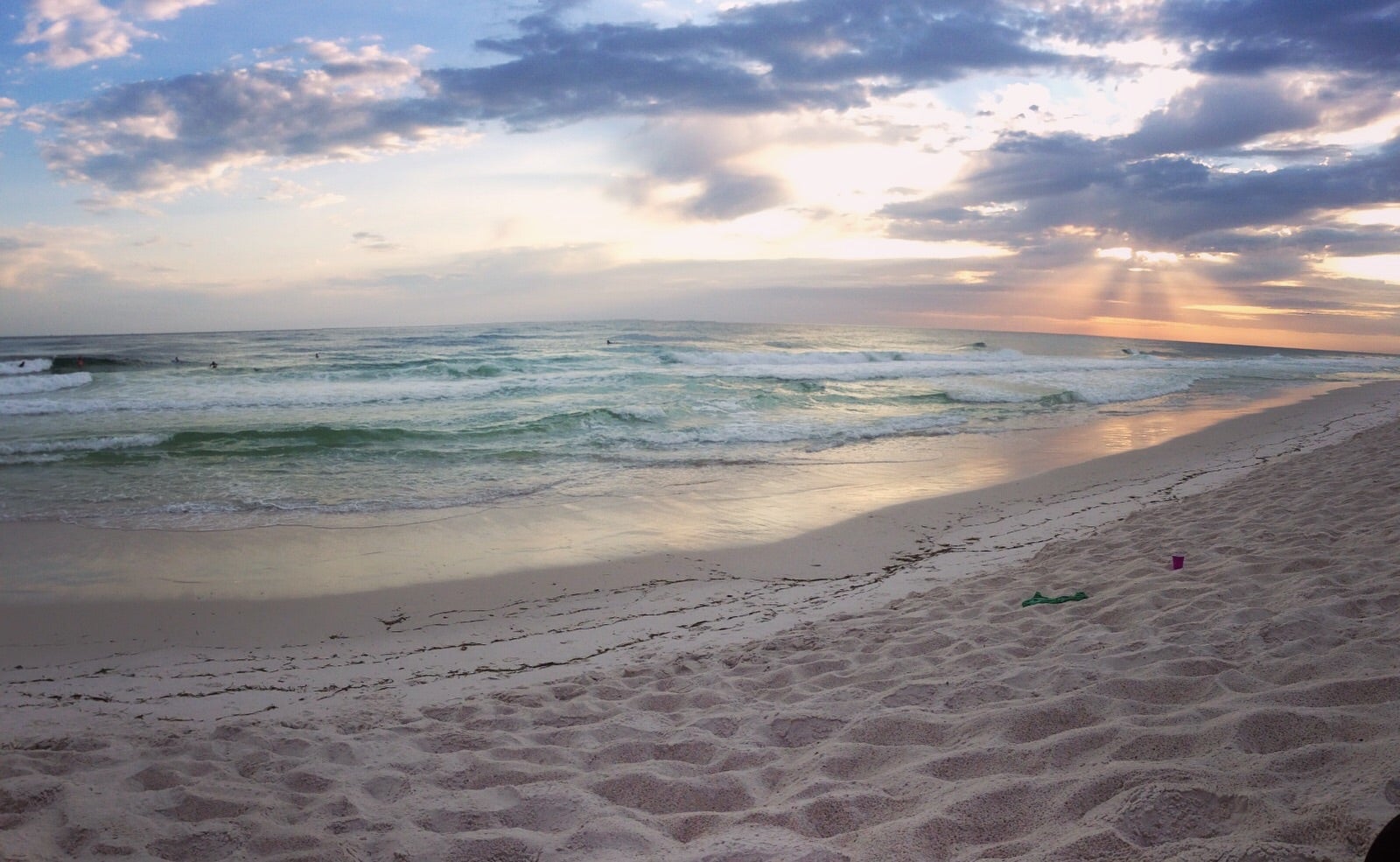 White sandy beach and emerald green water. 