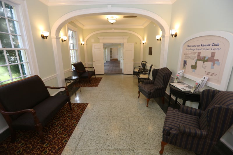 the interior hallway of a fancy house