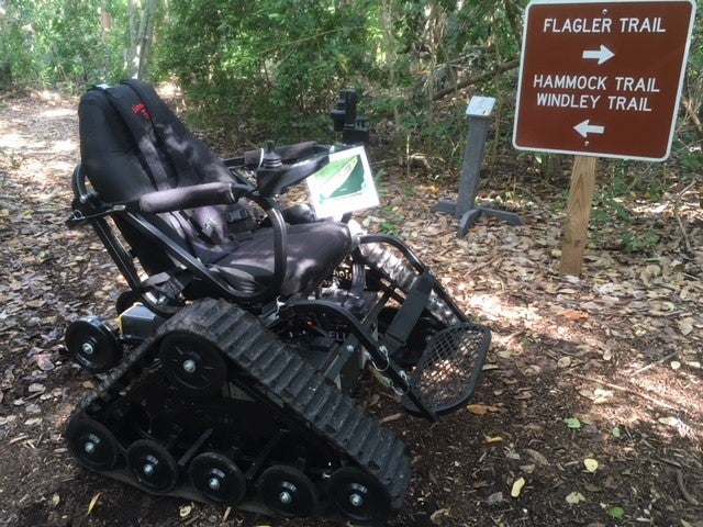 a power driven mobility chair that can be checked out from the park. 