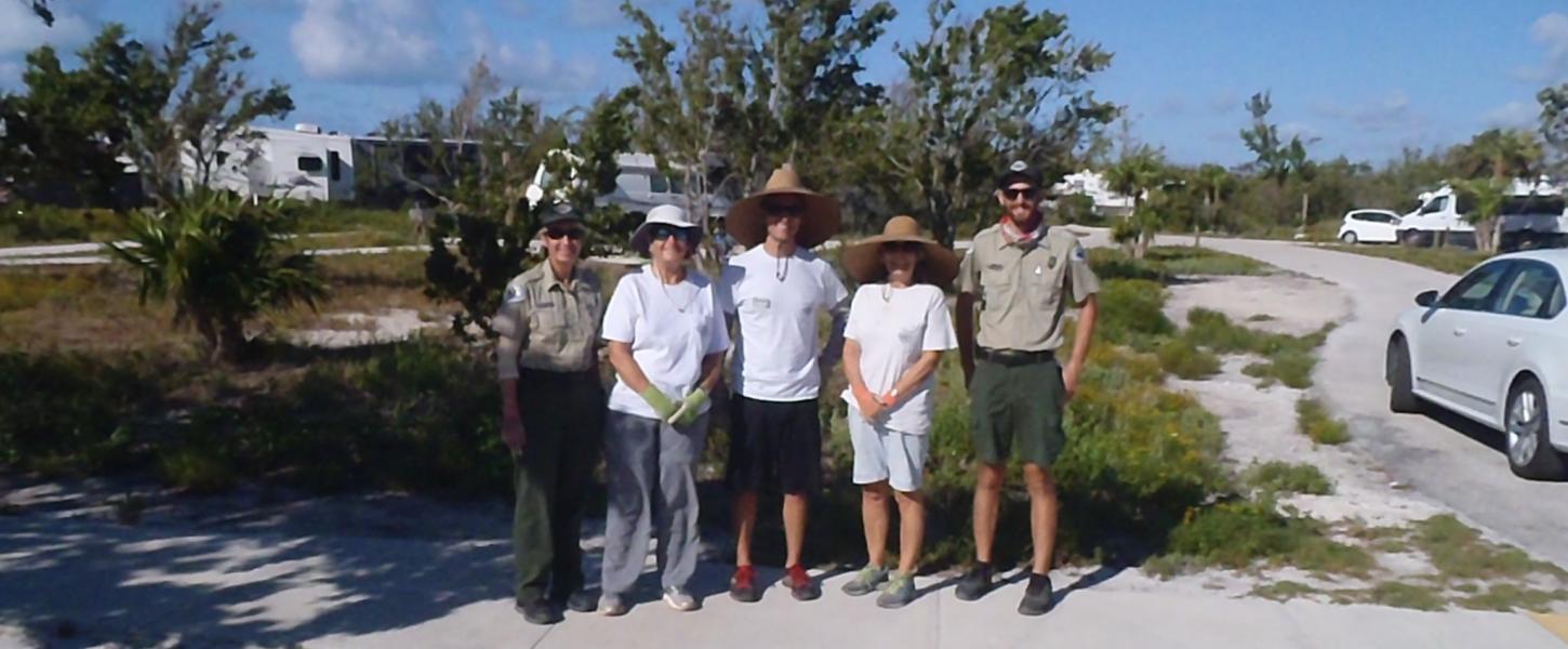 A group of volunteers posing for a picture.