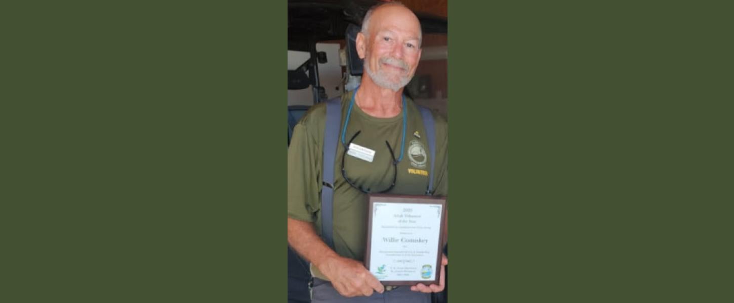 Volunteer receiving award.