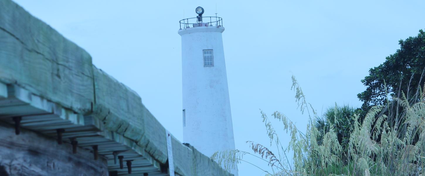 A view of the lighthouse through the fog.