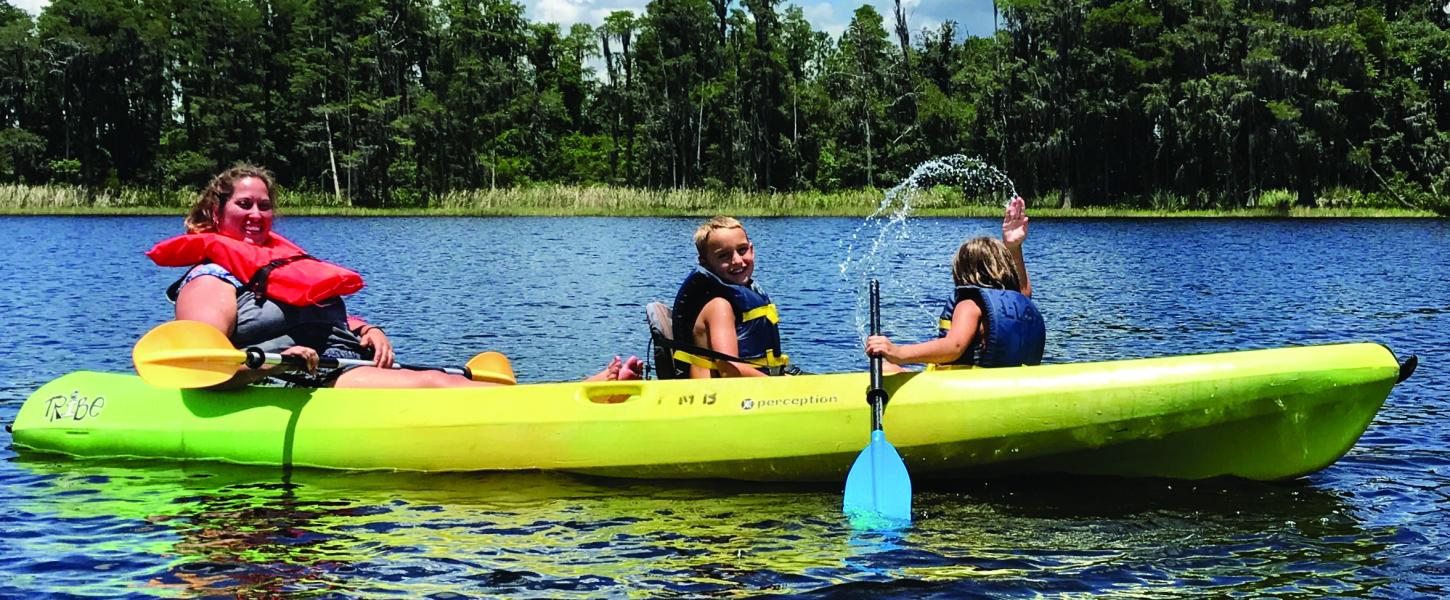 Family Kayaking on Lake