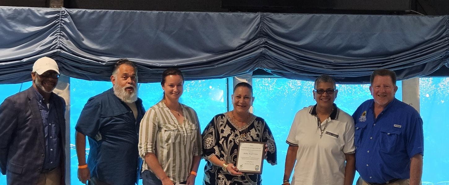 Volunteer receiving award.