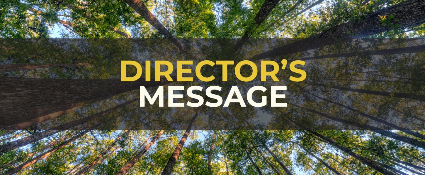 Title reads "Director's Message" with trees in the background.