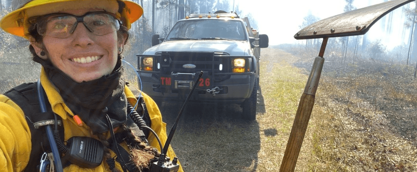 Emily Reyes with prescribed fire equipment. 