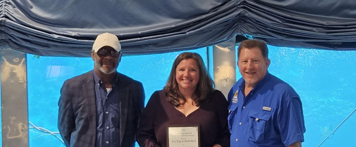 Volunteer receiving award.