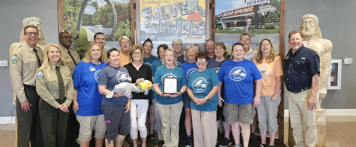 Volunteer receiving award.
