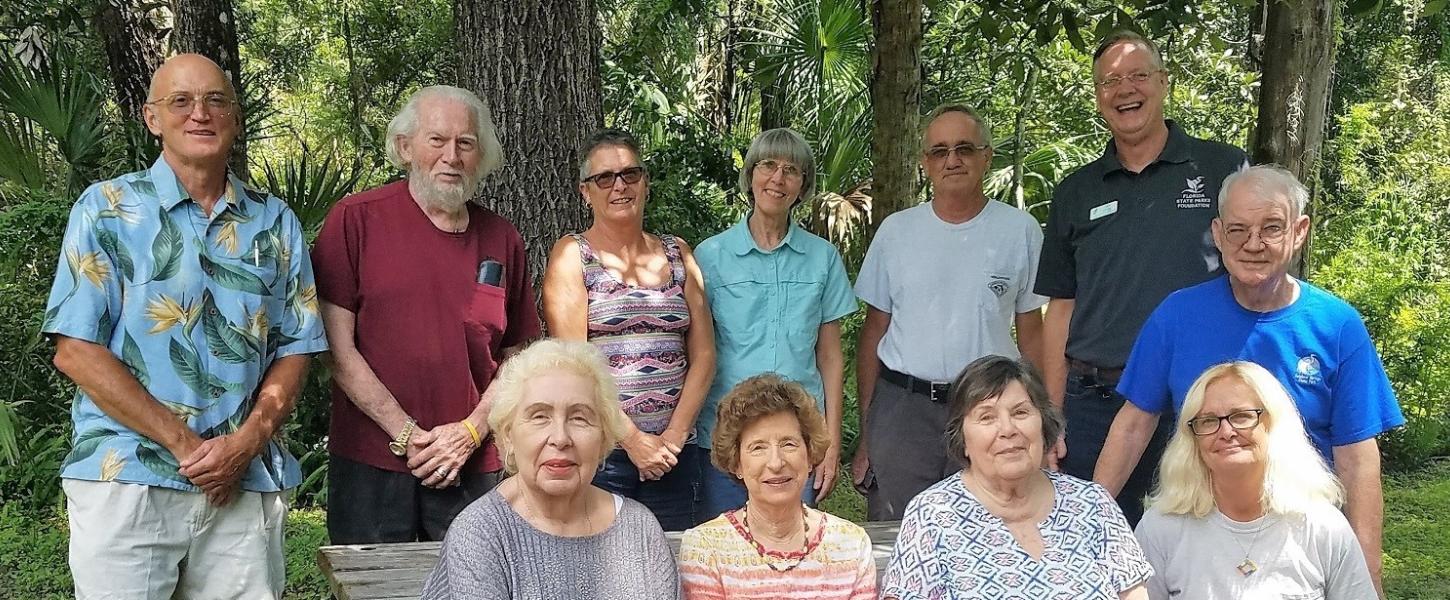 The Board of Directors smiling at the camera.