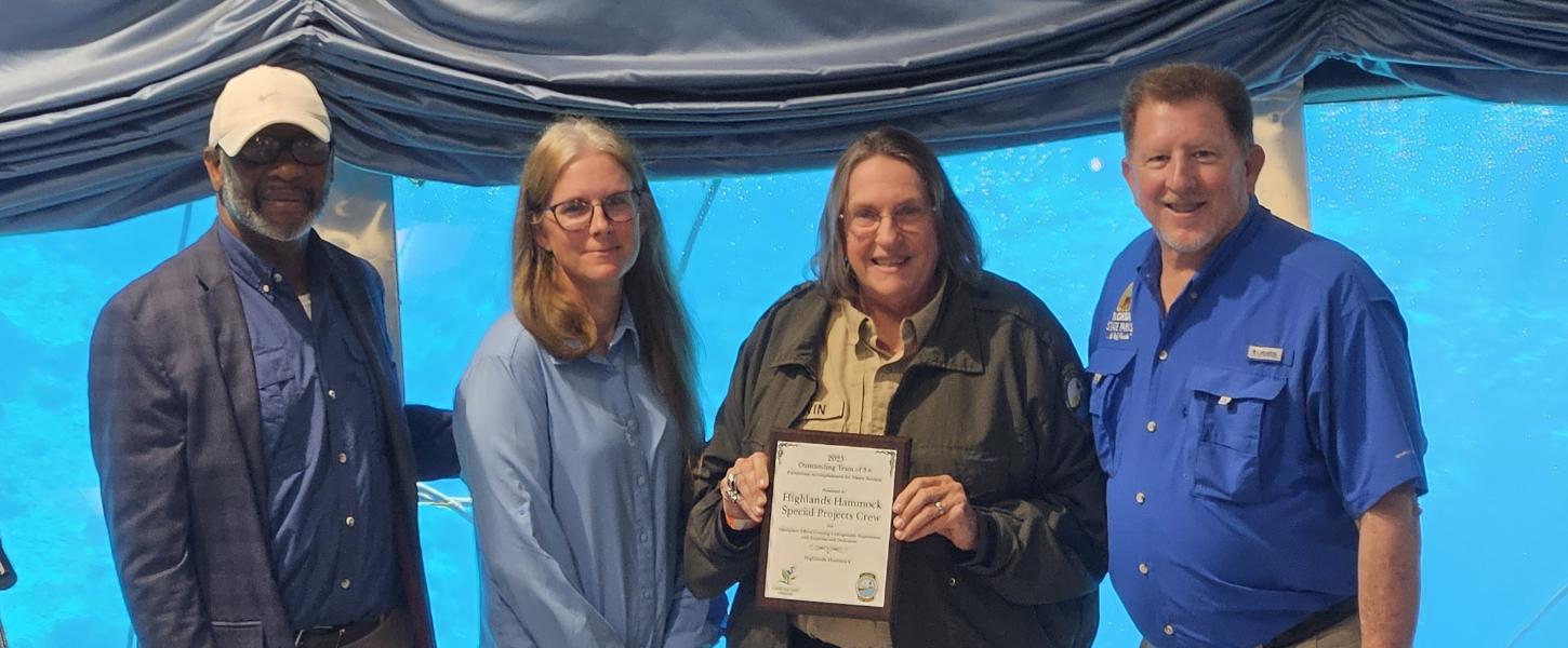 Volunteer receiving award.