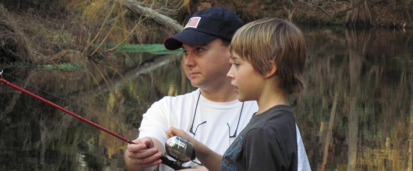 A father and son fish at Hillsborough River State Park.