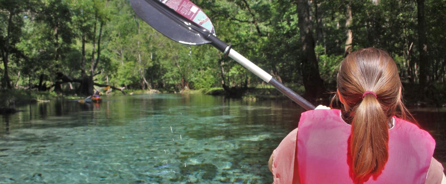 Visitor kayaks the spring run