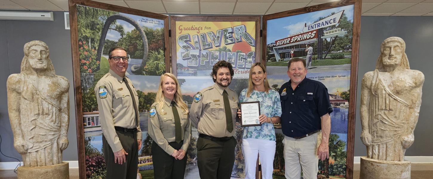 Volunteer receiving award.