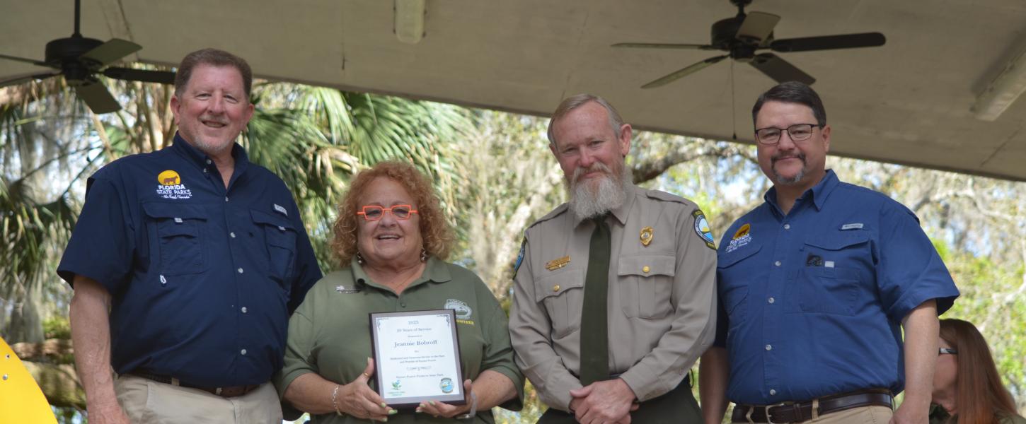 Volunteer receiving award.