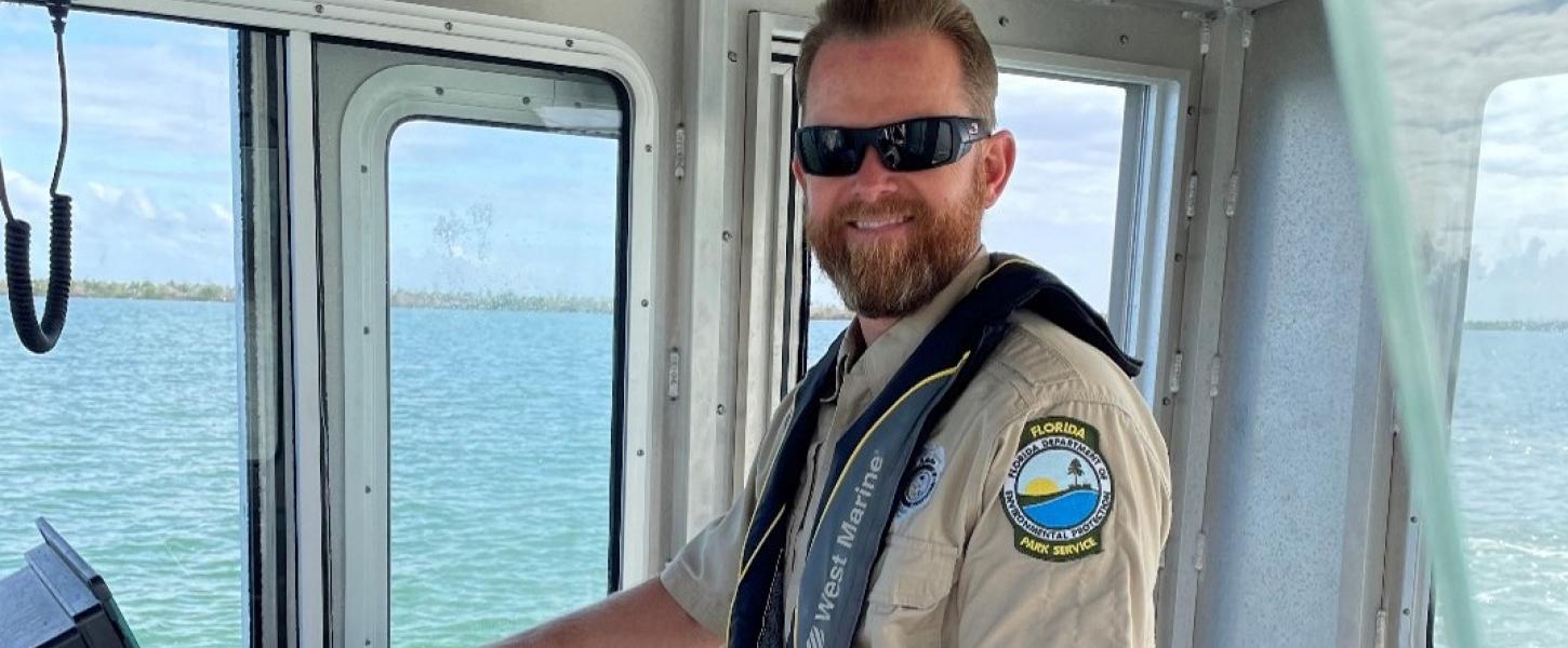 Josh Slaughter on a boat.