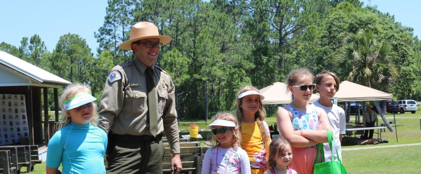 A group of Junior Rangers in Topsail Hill Preserve State Park.