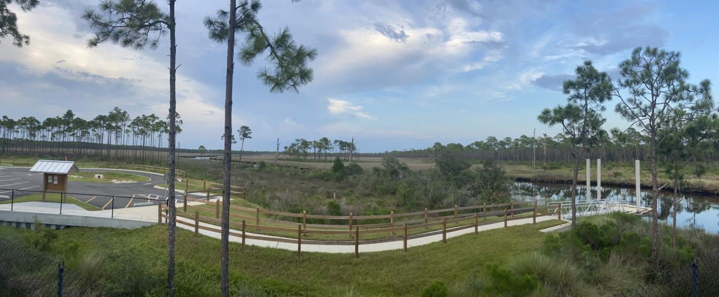 A side connects the parking area with kayak launch.