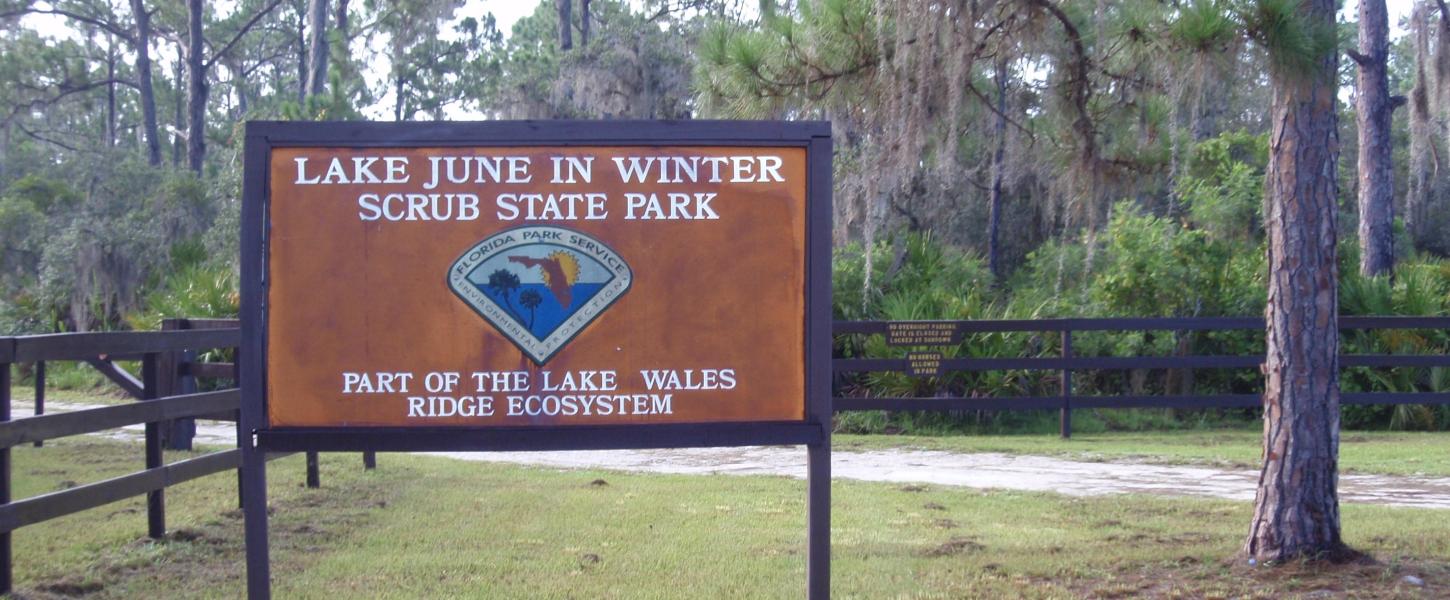 A view of the Lake June-in-Winter entrance sign.