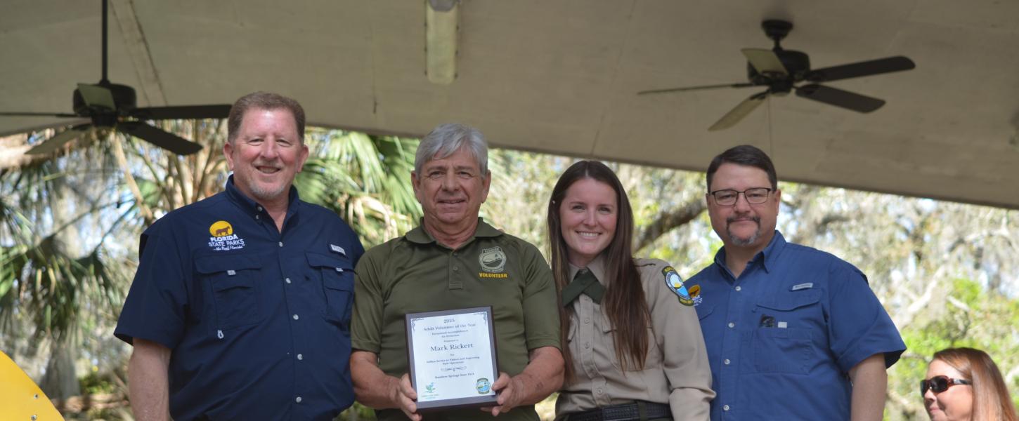 Volunteer receiving award.
