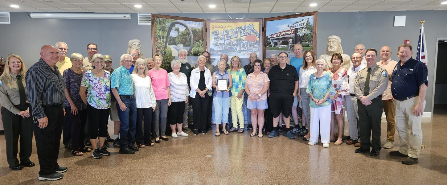 Volunteer receiving award.