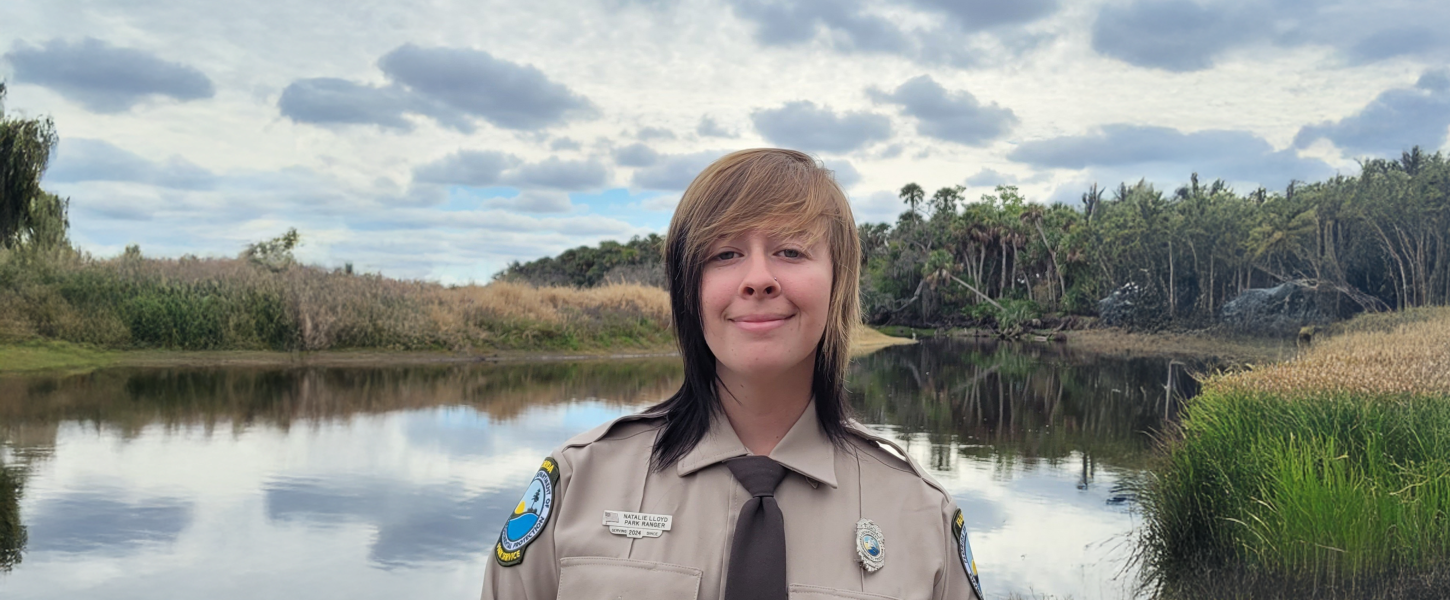 Natalie Lloyd in front of a lake.
