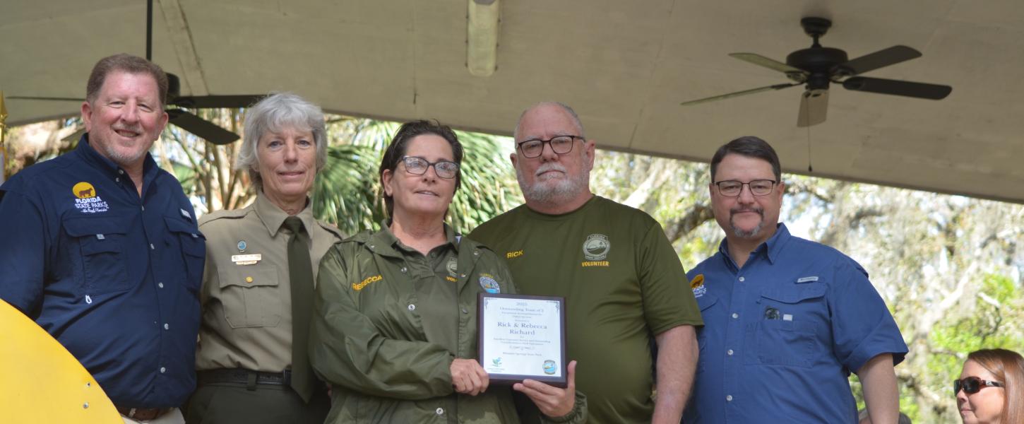 Volunteer receiving award.