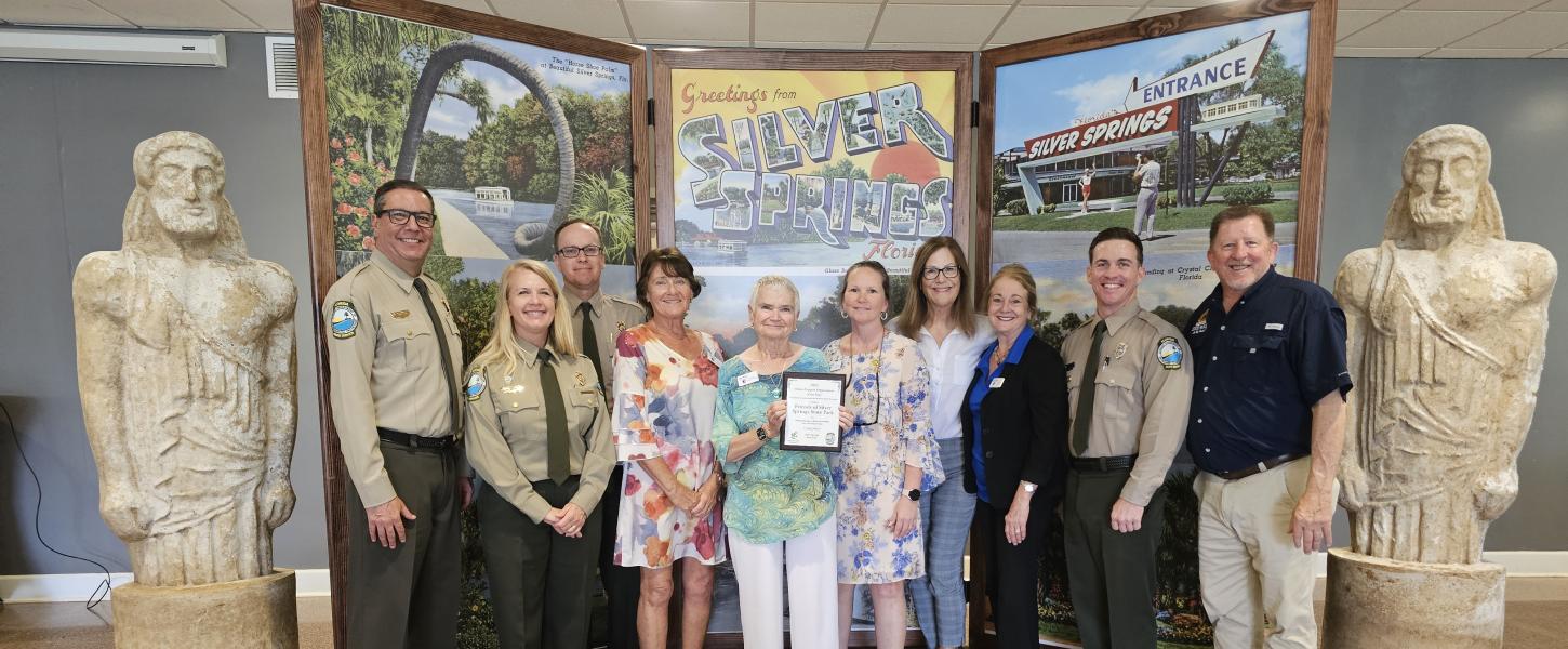Volunteer receiving award.