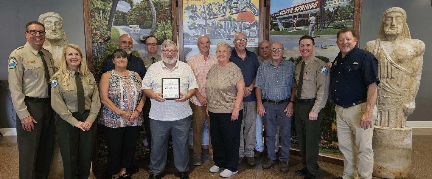 Volunteer receiving award.