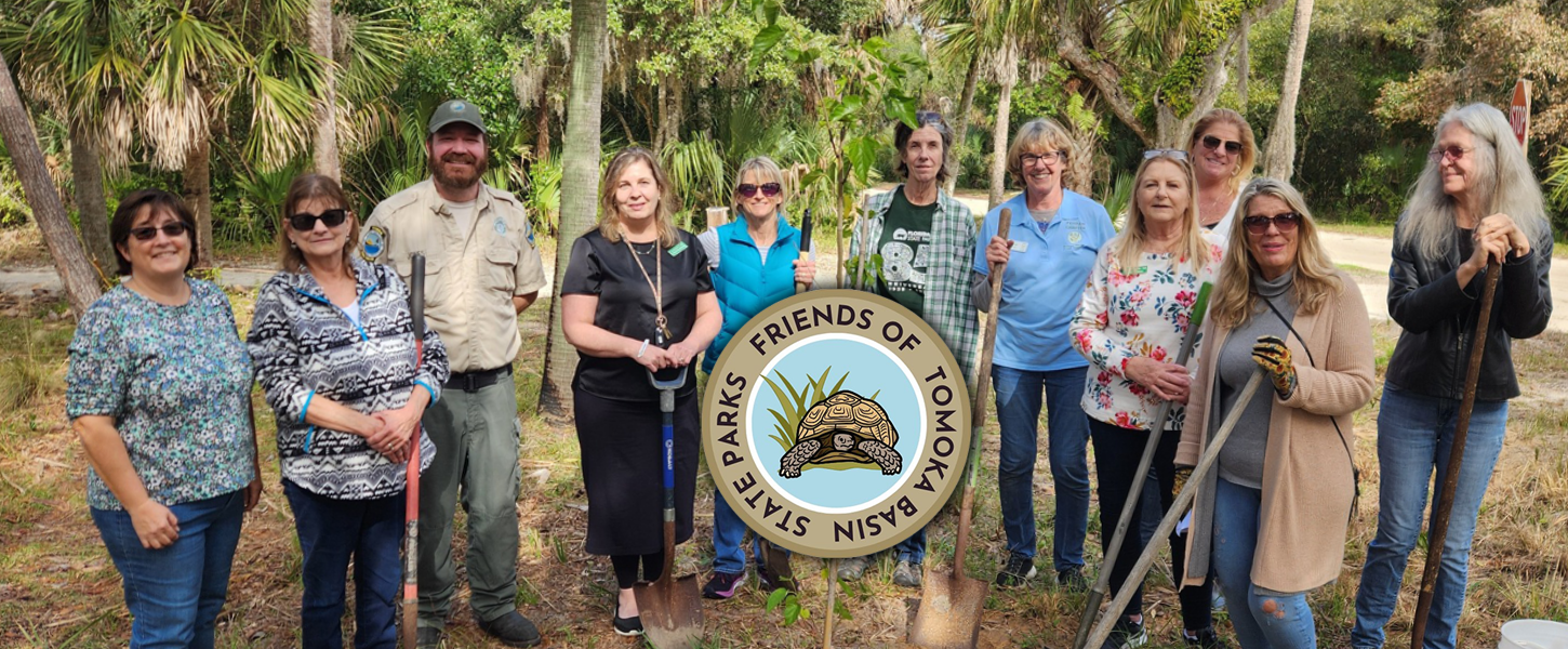 A group of volunteers with the logo of Friends of Tomoka Basin State Parks logo superimposed. 