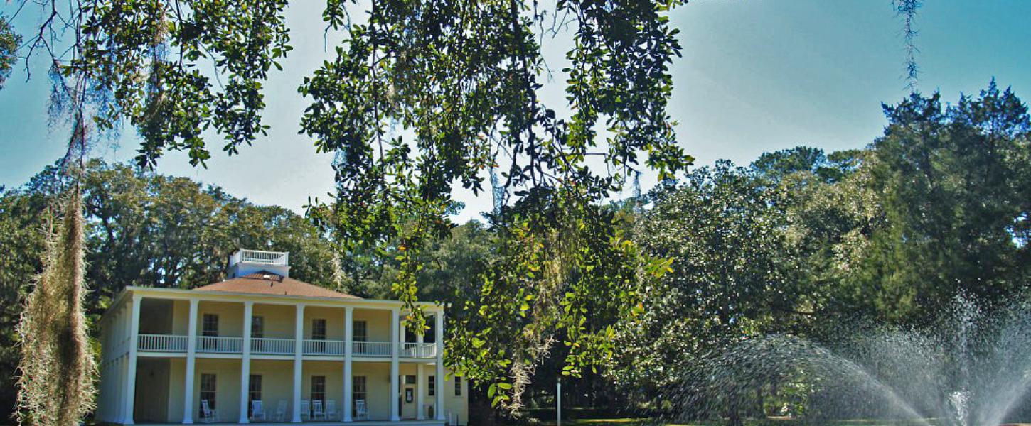 Wesley House and Reflection Pond at Eden Gardens