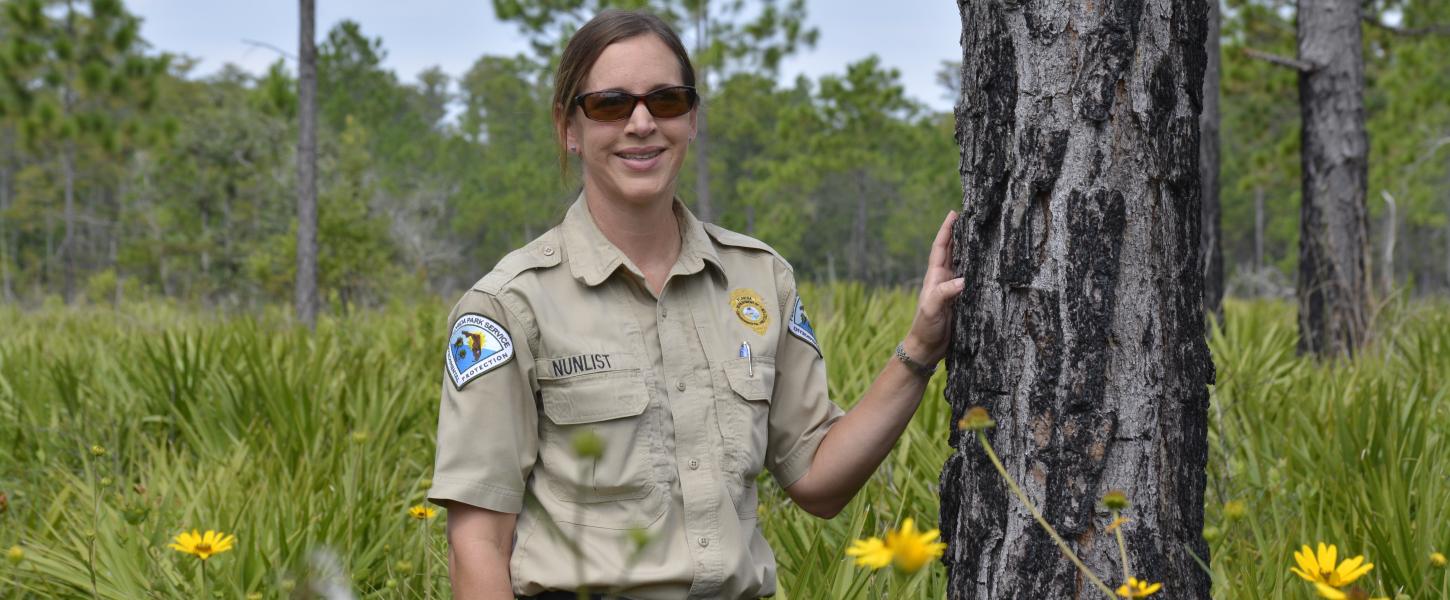 Rachel Nunlist, Lake Louisa Park Manager smiling at the camera