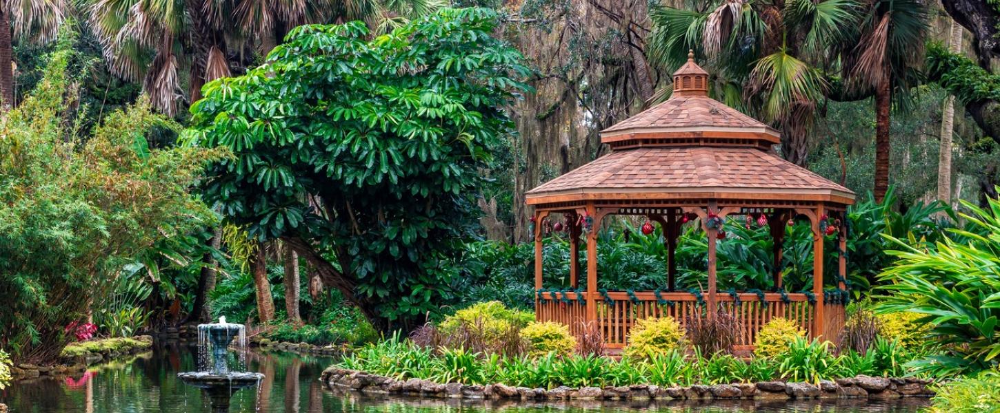 A gazebo at Washington Oaks Gardens State Park is decorated with festive tinsel and ornaments. 