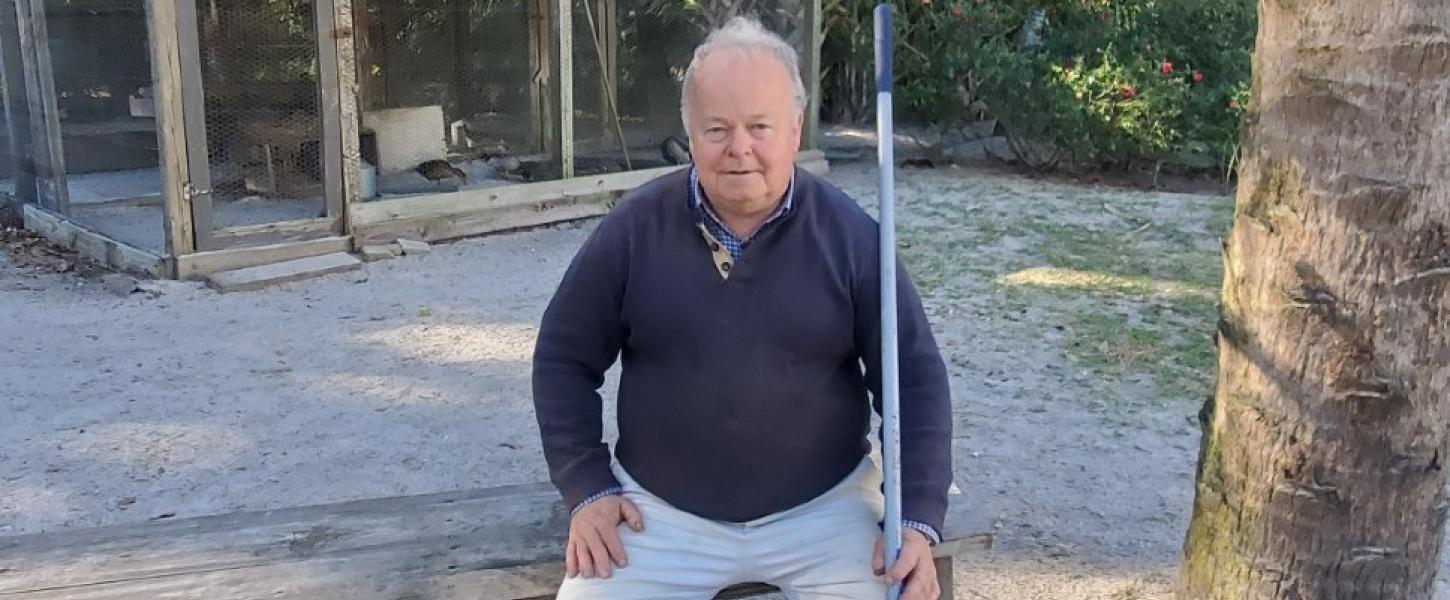 Geoff Gates sitting on a bench.