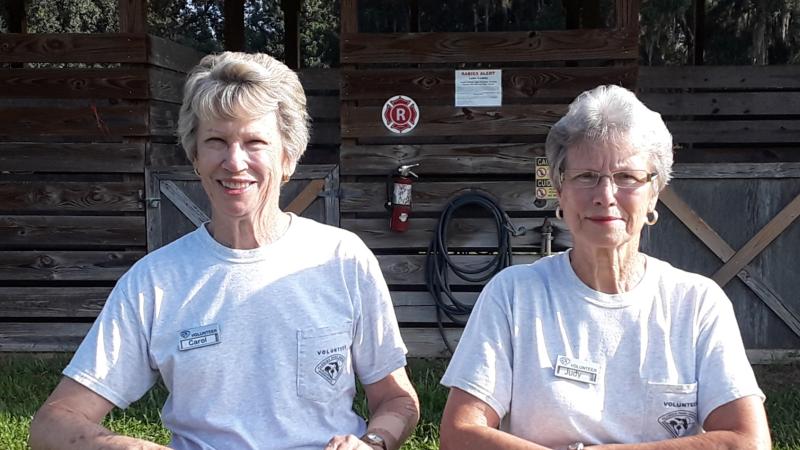 Lower Wekiva volunteers Judy & Carol smiling at the camera