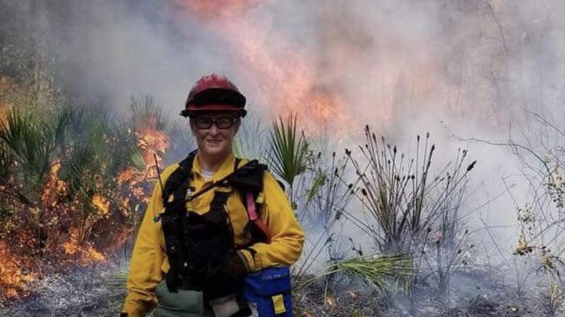 Elaine Fisher works on a prescribed fire.
