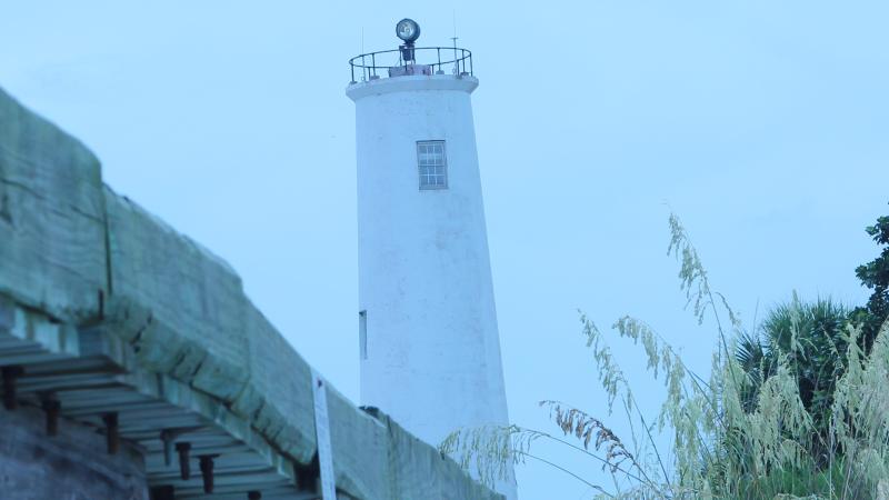 A view of the lighthouse through the fog.