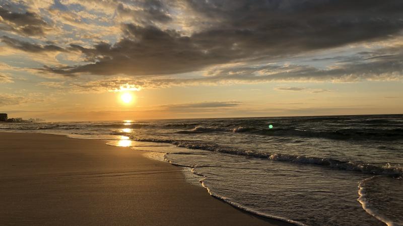 The beach at sunset.