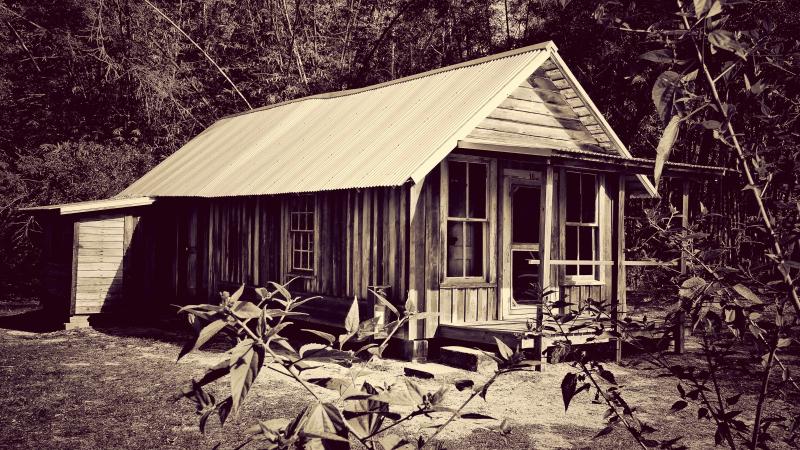 A black and white photo of a Koreshan house.