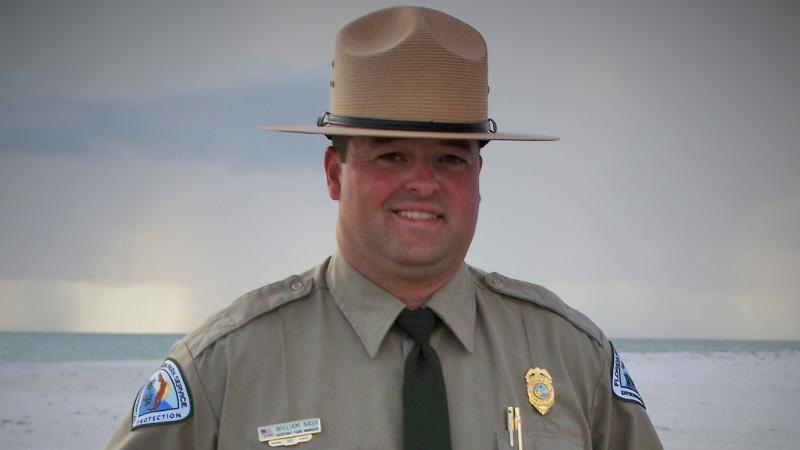 Bill Nash, smiling at the camera, wearing his ranger uniform.