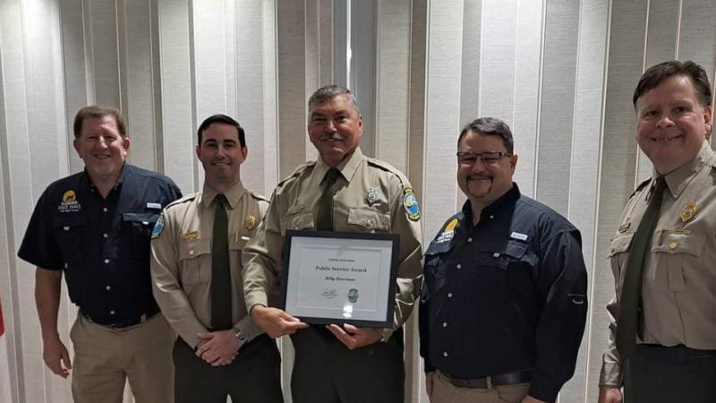 Bill Harrison receives an award from Chuck Hatcher, Lance Kelly, Brian Fugate and Steve Cutshaw.