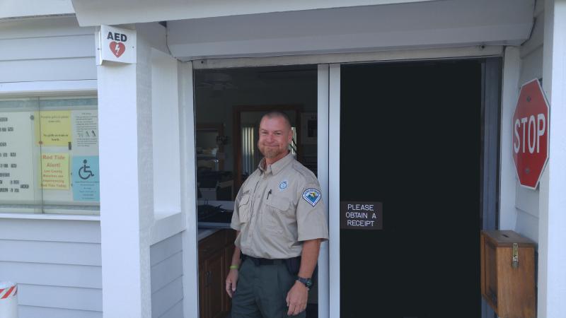 Bryan, standing in the doorway of the ranger station.